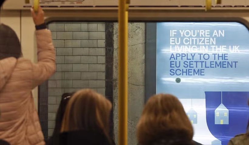 A POSTER FOR THE GOVERNMENT'S POST-BREXIT EU SETTLEMENT SCHEME AFP/GETTY IMAGES